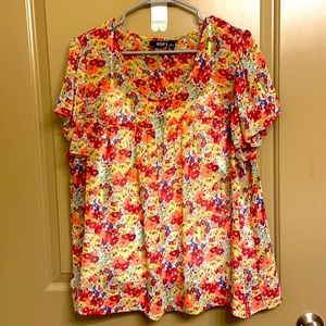 Shear flower top with white under tank